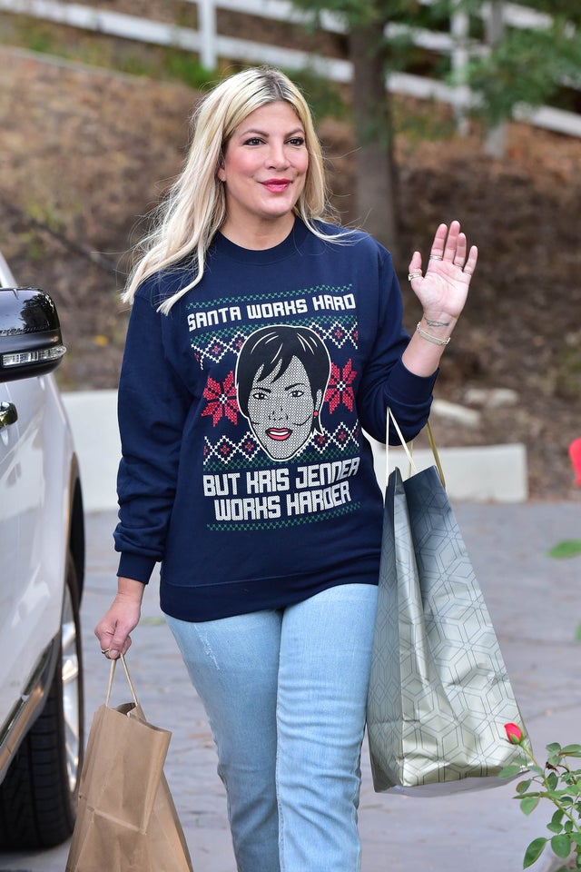 tori spelling in ugly xmas sweater