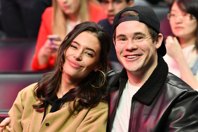 Chloe Bridges and Adam Devine at clippers game