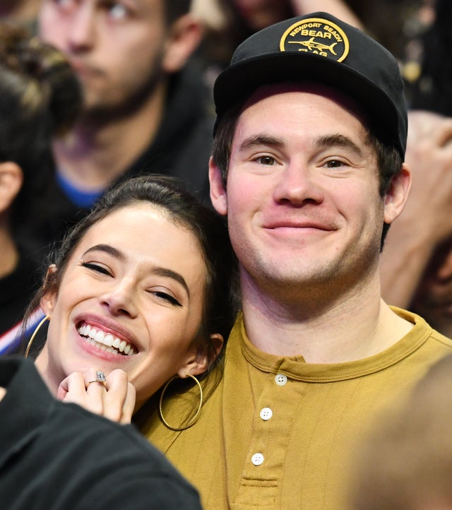 Chloe Bridges and Adam Devine at clippers game