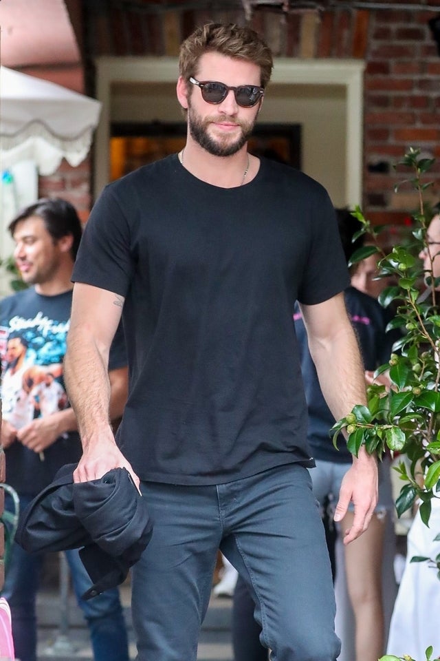 liam hemsworth exits the ivy