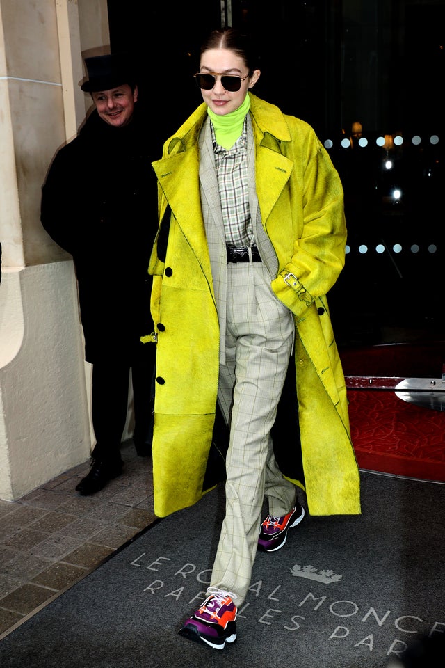 gigi hadid in yellow coat in paris