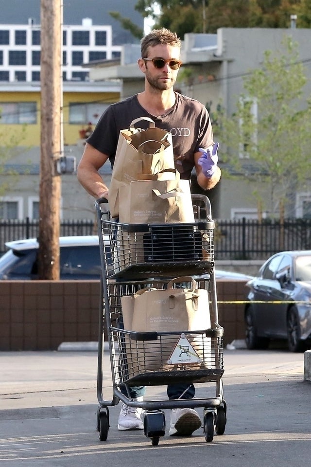 chase crawford at gelson's with gloves