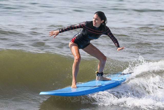 Bethenny Frankel surfing