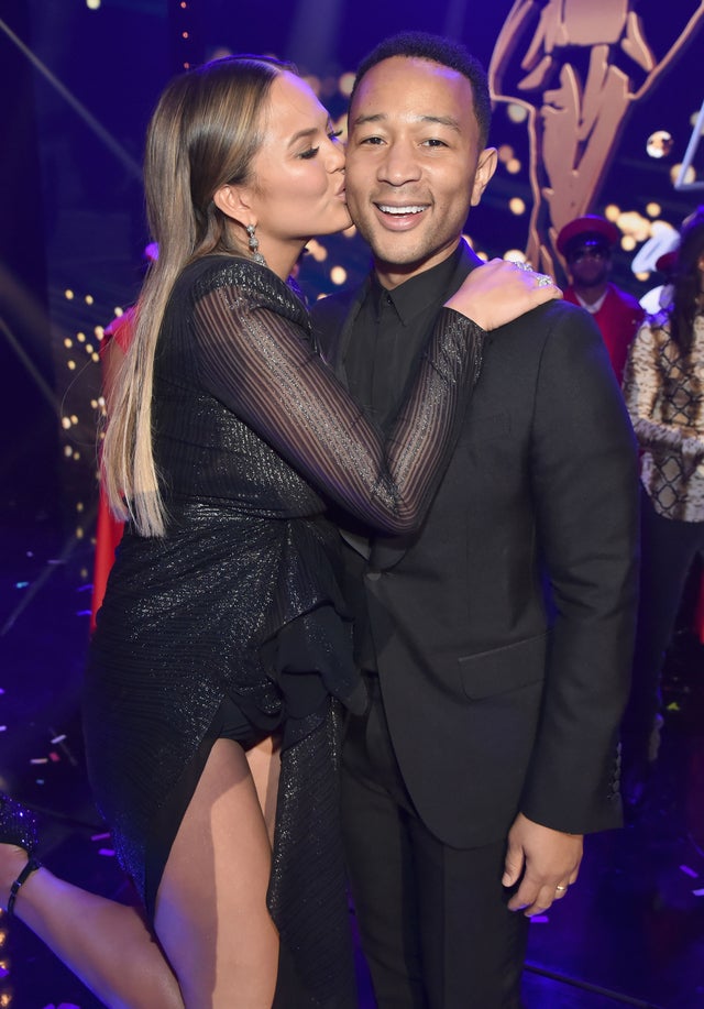 Chrissy Teigen and John Legend pose onstage during Lip Sync Battle Live: A Michael Jackson Celebration 