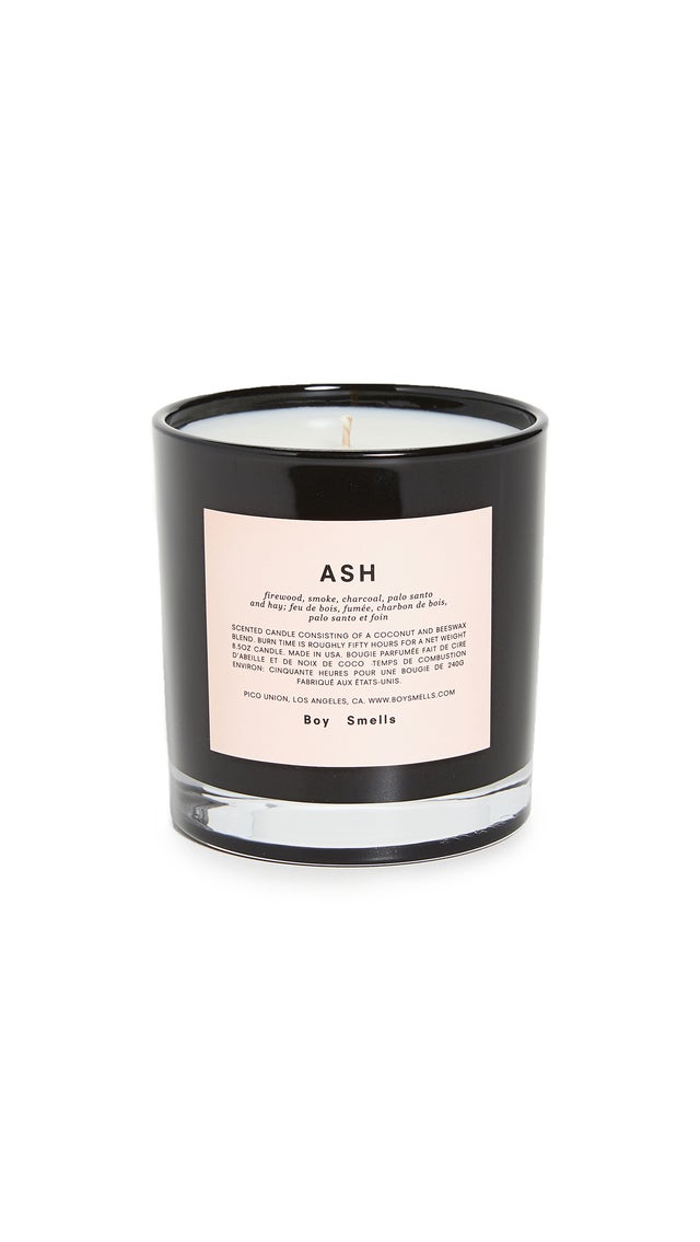 Boy Smells Ash Candle