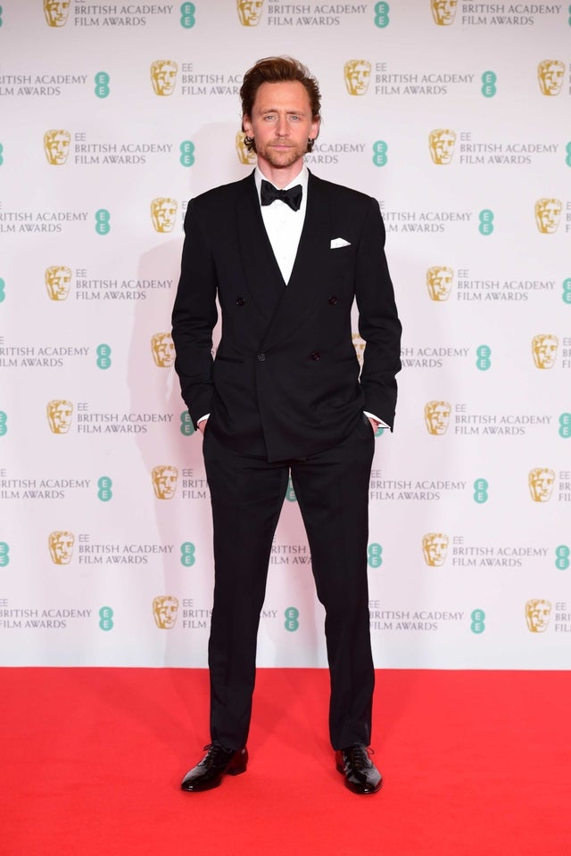 Tom Hiddleston arrives for the EE BAFTA Film Awards at the Royal Albert Hall in London. 