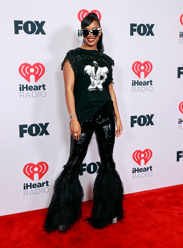  H.E.R. attends the 2021 iHeartRadio Music Awards at The Dolby Theatre in Los Angeles, California, which was broadcast live on FOX on May 27, 2021. 