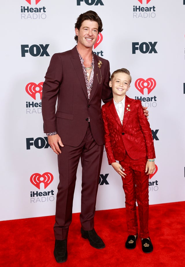  Robin Thicke and Julian Fuego Thicke attend the 2021 iHeartRadio Music Awards at The Dolby Theatre in Los Angeles, California, which was broadcast live on FOX on May 27, 2021.