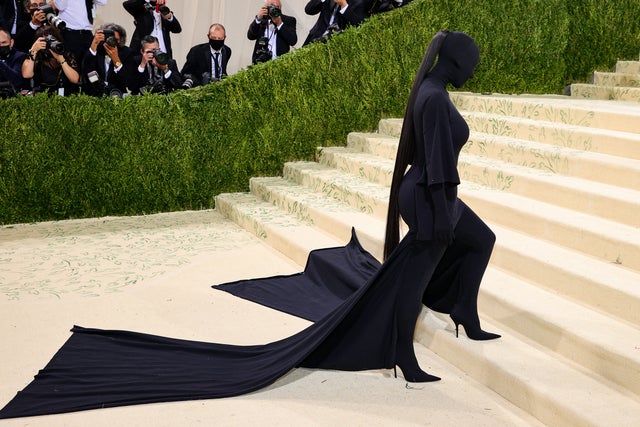 Kim Kardashian wears skintight bodysuit and mask at awards with