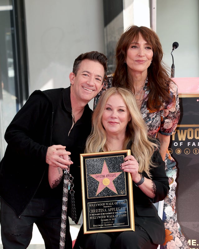 Christina Applegate's Married With Children co-stars, David Faustino, Katey Sagal, were on hand for her Hollywood Walk of Fame Ceremony on Nov. 14, 2022 in Los Angeles, California.