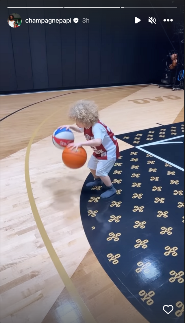 Drake and son Adonis, 5, match in leather jackets at basketball game