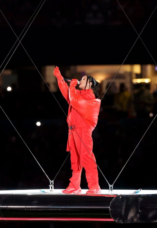 Rihanna Soars In Super Bowl Halftime Show; Reveals New Baby Bump