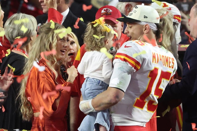 Patrick Mahomes kisses wife after Chiefs' Super Bowl 2023 win