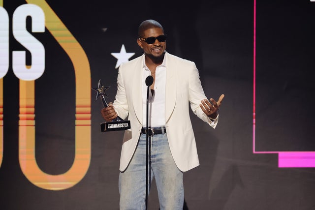  Usher accepts the award for Best Male R&B/Pop Artist onstage during the 2024 BET Awards