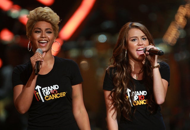 Beyonce and Miley Cyrus perform on stage during the Conde Nast Media Group's Fifth Annual Fashion Rocks at Radio City Music Hall on Sept. 5, 2008 in New York City.