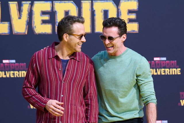 Actors Ryan Reynolds (l) and Hugh Jackman arrive at the Uber Arena for the theatrical release of "Deadpool and Wolverine". Photo: Annette Riedl/dpa