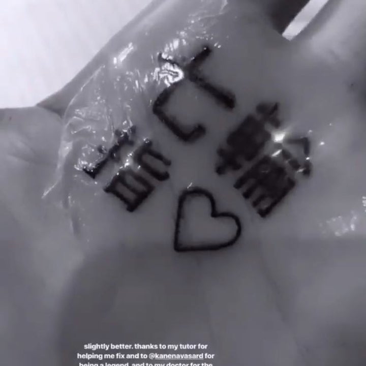 Ariana Grande didnt intend her new Japanese tattoo to say barbecue grill