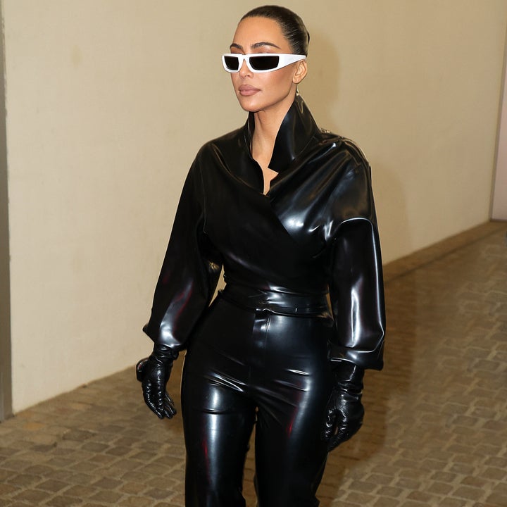 Kim Kardashian Gets Edgy in Belted Skirt & Boots at Milan Fashion Week –  Footwear News