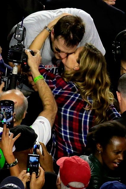 Gisele Bündchen and Tom Brady Cuddle Up Following Patriots Win