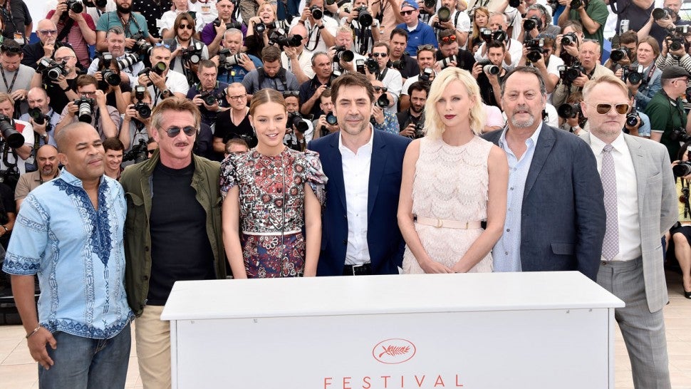 Charlize shines at Cannes while Sean Penn takes a step back