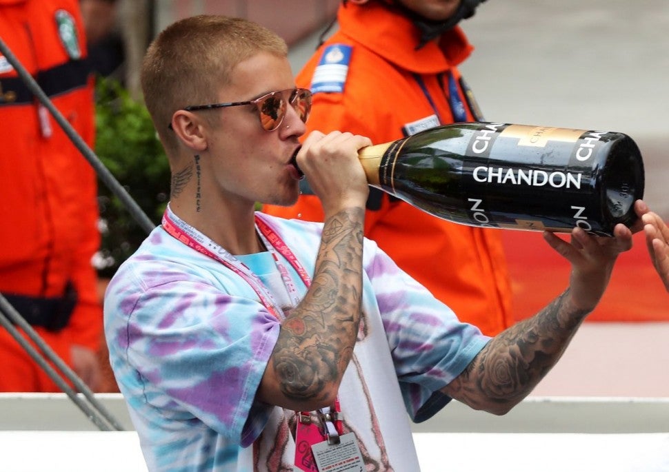 Justin Bieber First to Congratulate Lewis Hamilton on Monaco Grand Prix Win  -- Watch Him Swig Champagne!