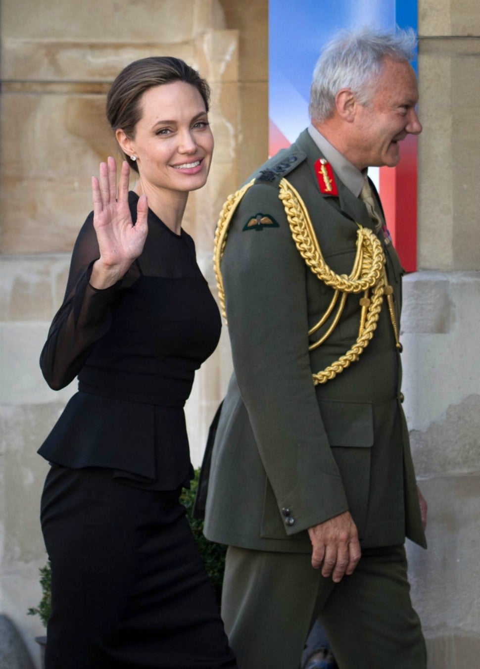 Angelina Jolie Slips on Pumps and Keeps It Classy in Black Midi Dress –  Footwear News