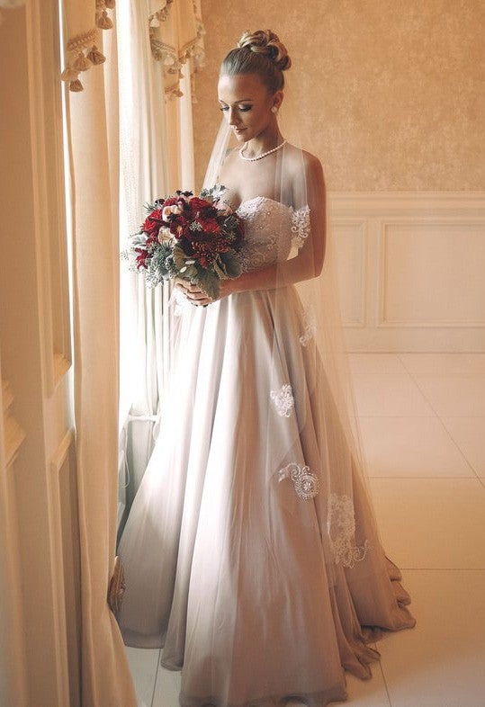14 Most Gorgeous Celeb Wedding Dresses of 2016