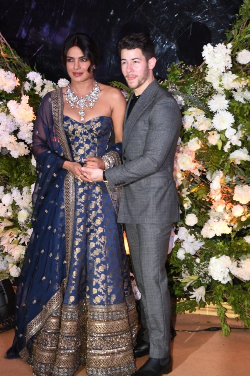 Priyanka Chopra And Nick Jonas Return To India To Host Their