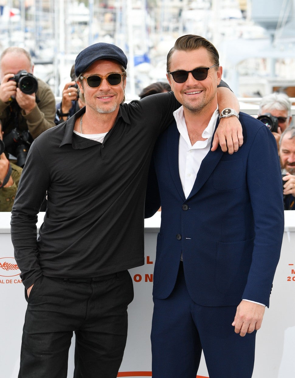 Brad Pitt and Leonardo DiCaprio attend the photocall for 