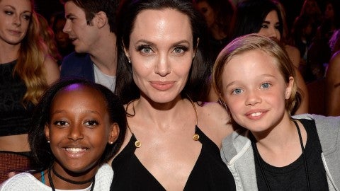 Angelina Jolie Slips on Pumps and Keeps It Classy in Black Midi Dress –  Footwear News