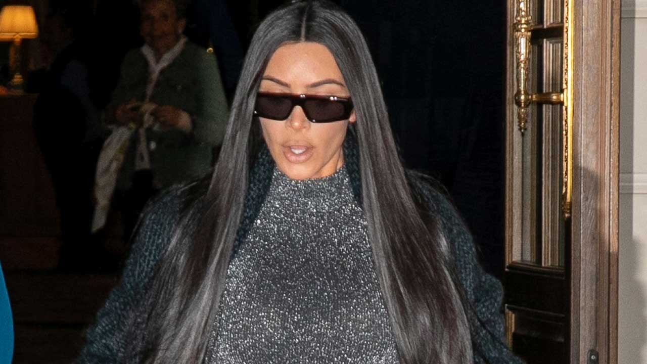 Kim Kardashian shows off tiny frame in skintight bodysuit she made from  cut-up $795 tee-shirt in Paris with North, 9
