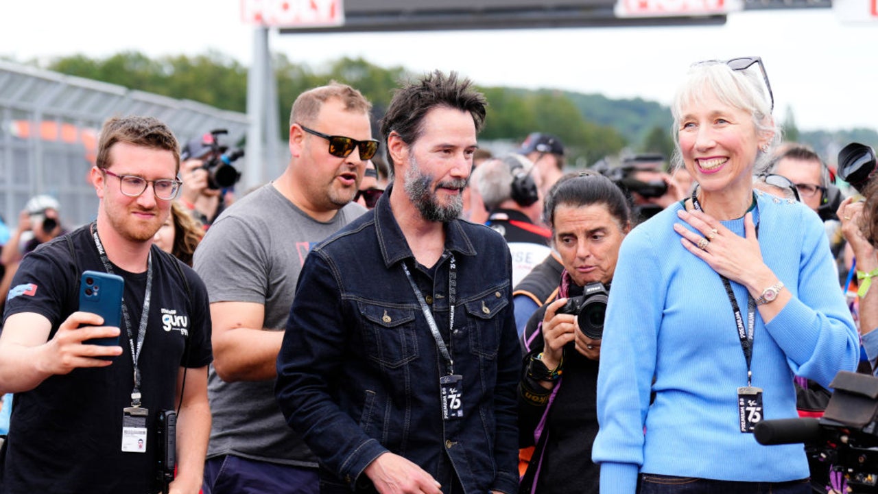 Keanu Reeves and Girlfriend Alexandra Grant Enjoy Day Out at Motorcycle Race in Germany