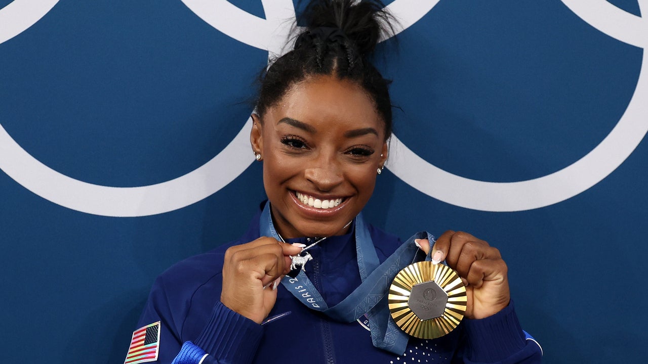 Simone Biles Shows Off New Goat Necklace at Paris Olympics and Loves That 'Haters Hate It'