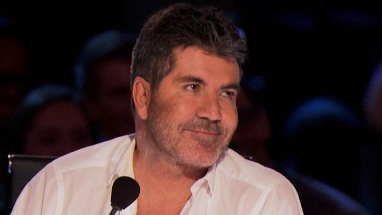 Simon Cowell Meets His Match In Heidi Klum On Americas Got Talent Entertainment Tonight 