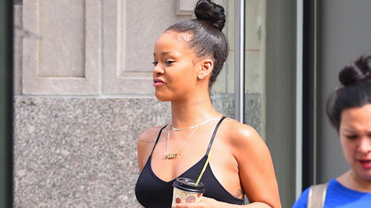 Rihanna shows off her toned abs in plunging bralet in New York