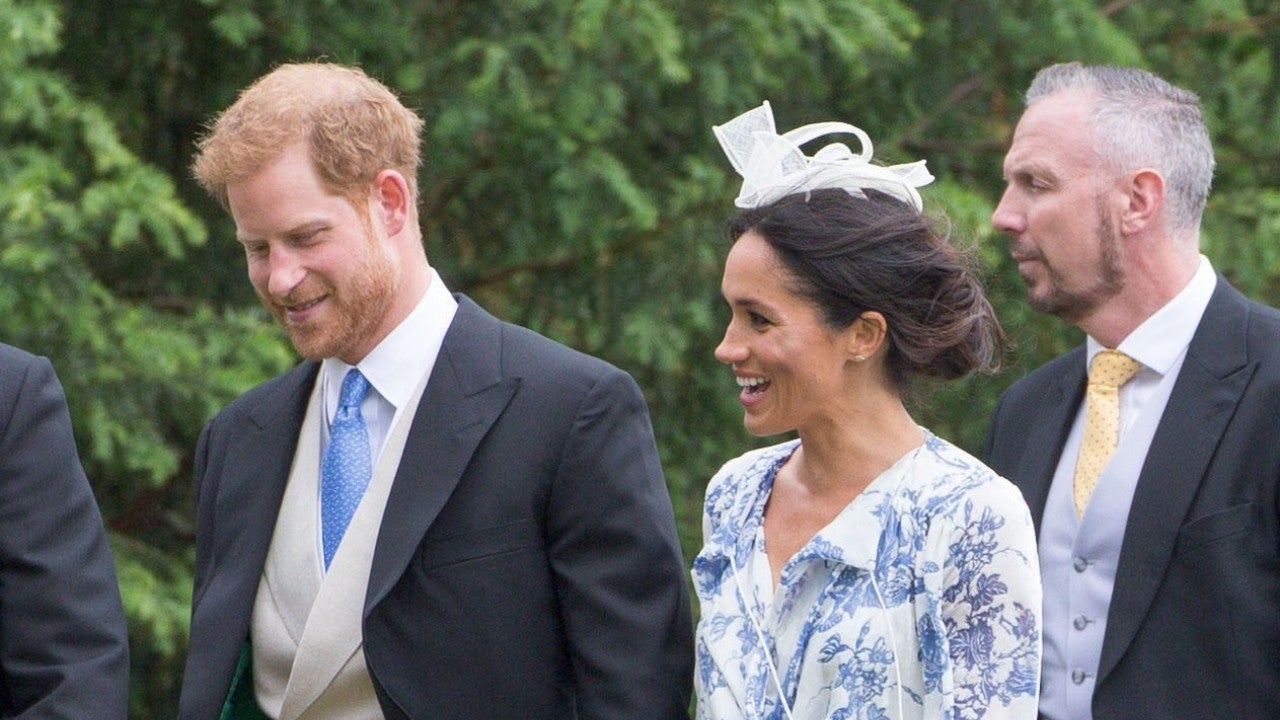 Meghan Markle Gracefully Holds on to Prince Harry as She ...