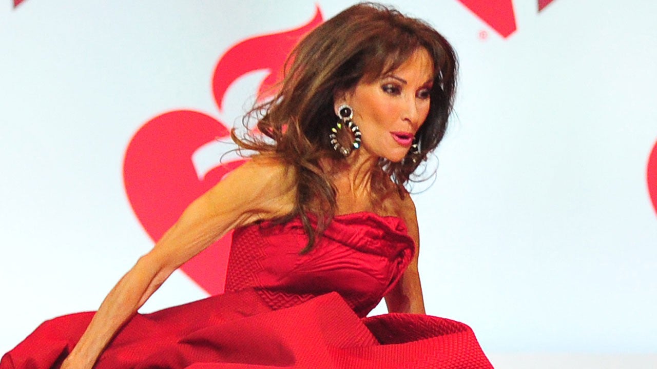 Watch Susan Lucci Take A Tumble At Red Dress Fashion Show Entertainment Tonight 