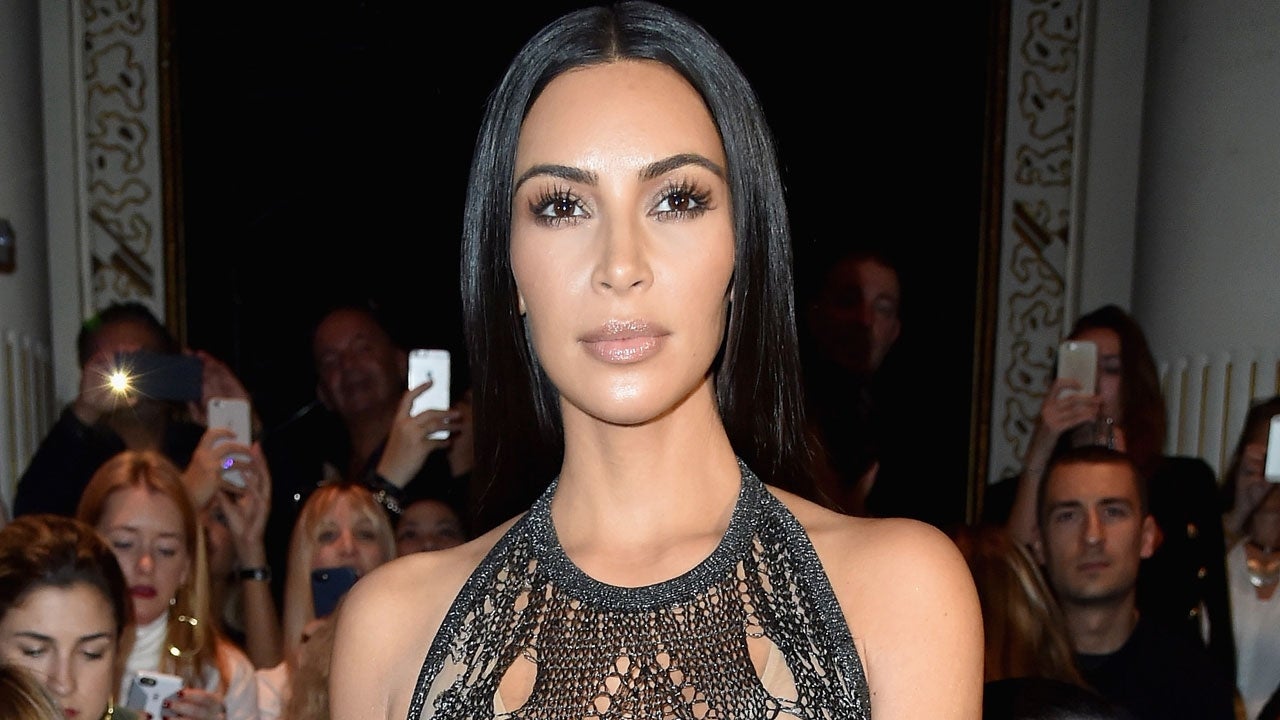 Kim Kardashian Stepped Out in a Silver Bikini Top and Matching Skintight  Pants in Miami