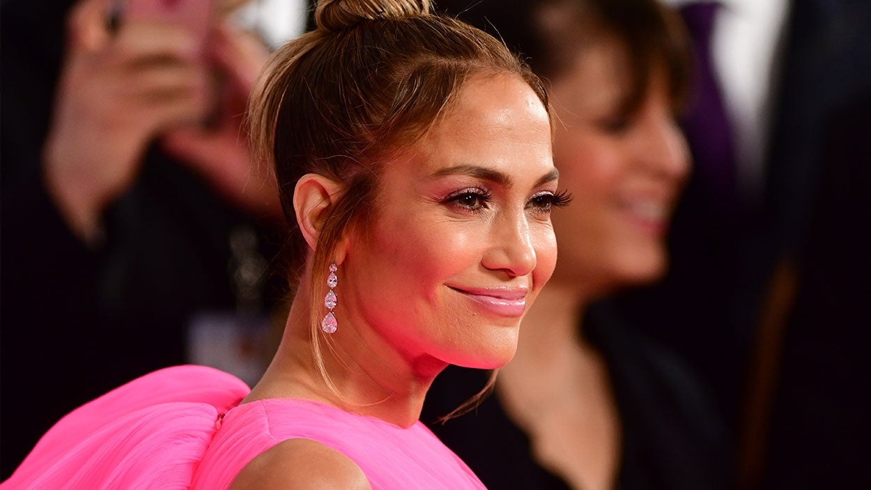 Jennifer Lopez is Christmas-ready in red-hot suit and custom bag