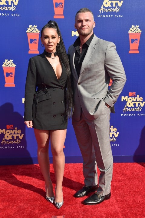 Elisabeth Moss and Aubrey Plaza walk the red carpet for MTV Movie & TV  Awards