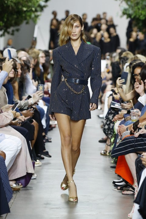 Model walks on the runway at the Michael Kors fashion show during