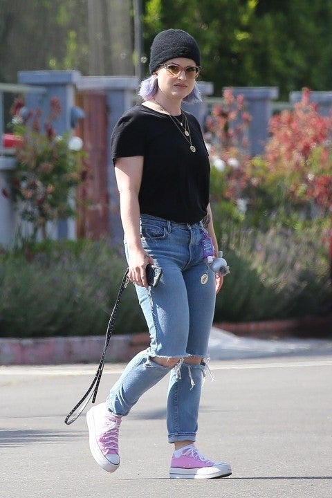 Nikki Bella rocks black spandex jumpsuit and snakeskin boots while visiting  a friend in Brentwood, California