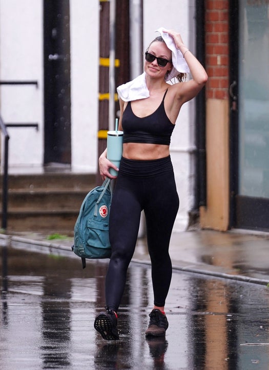 Kendall Jenner sports a hoodie and leggings as she braves the rain while  running a few