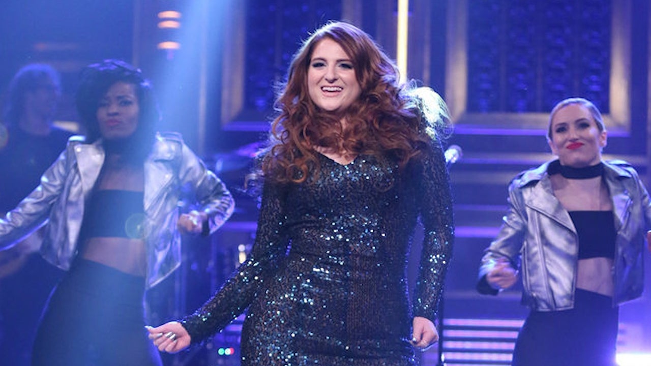 Meghan Trainor's purple draped dress & crystal bow pumps from her