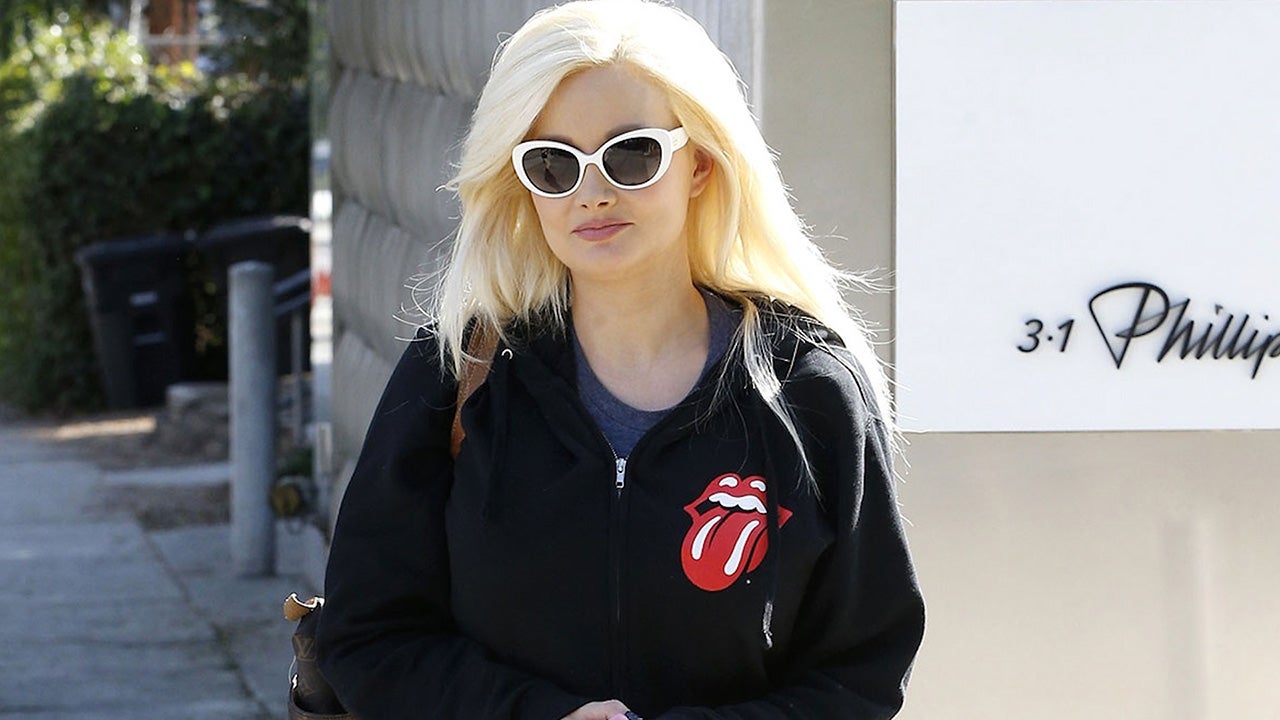 Holly Madison braves the open air sans mask for a weekend errand run with  her precious pooch