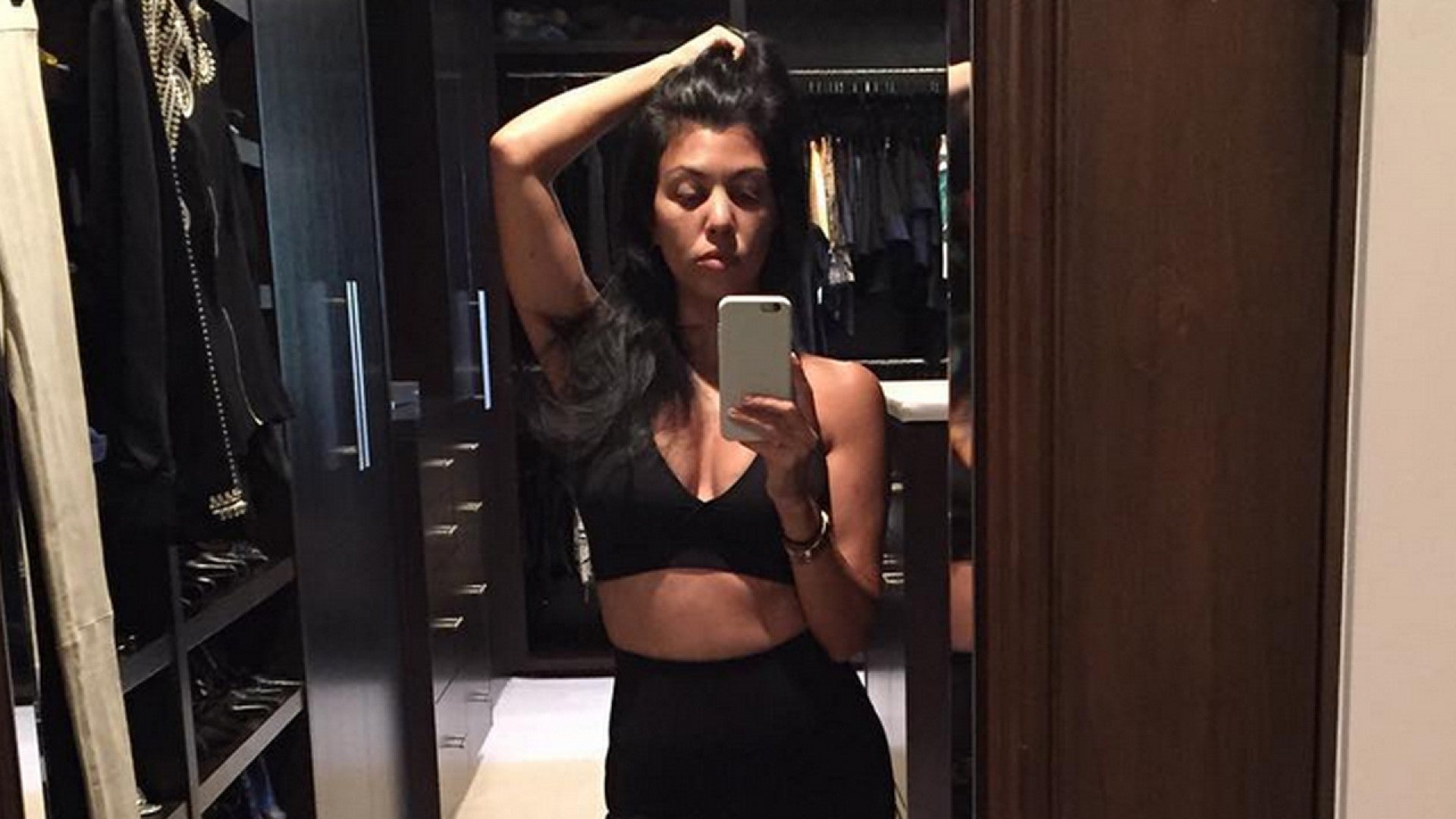 Kourtney Kardashian proudly celebrates belly rolls & stretch marks in new  video amid concern over Khloe's thinning frame