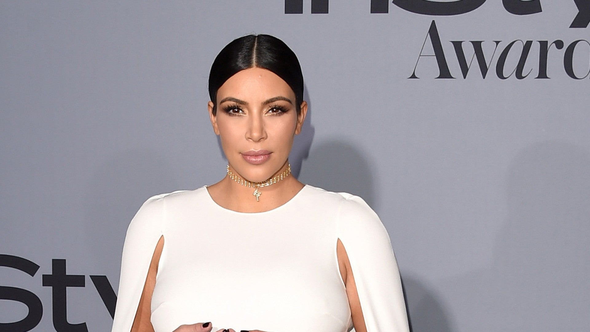 Kim Kardashian Reveals She Threw Her Back Out