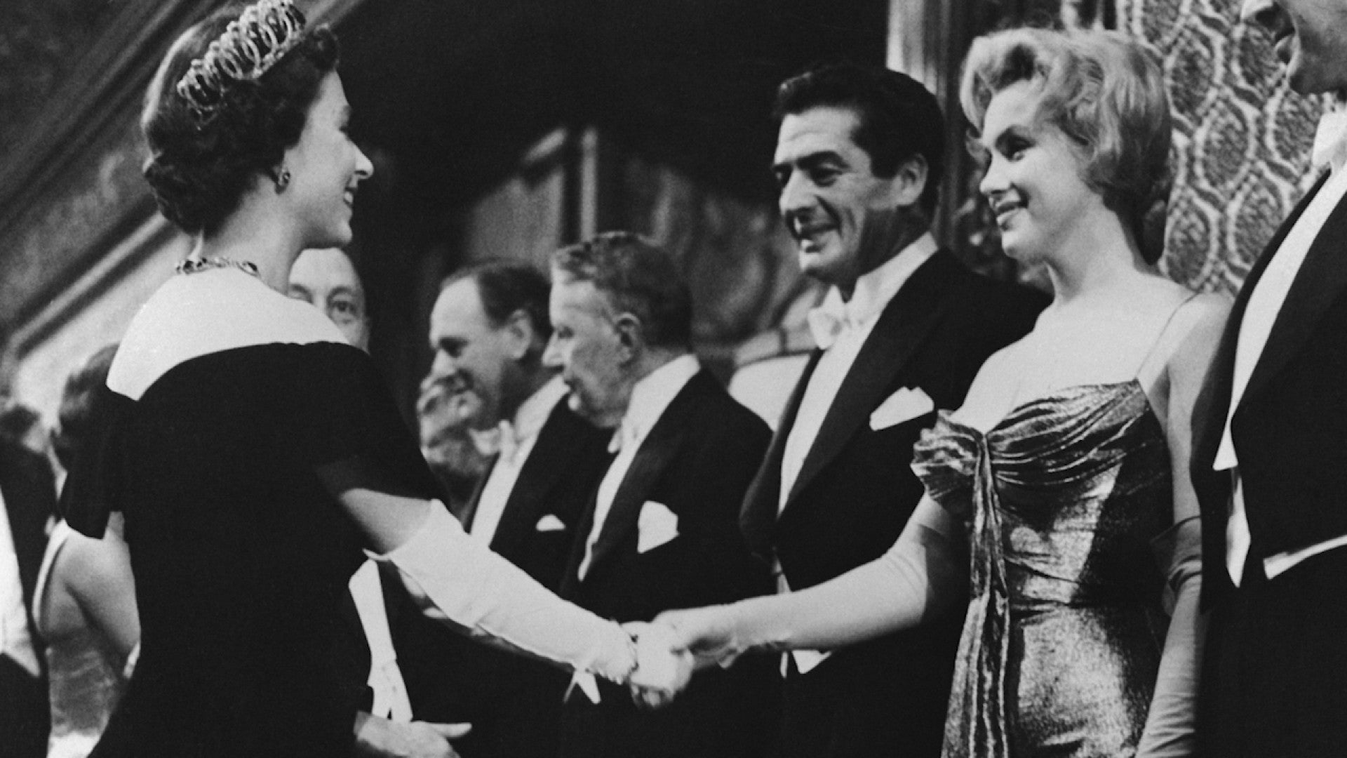 Marilyn Monroe Once Met The Queen At A Film Premiere In London See The Rare Regal Footage Entertainment Tonight