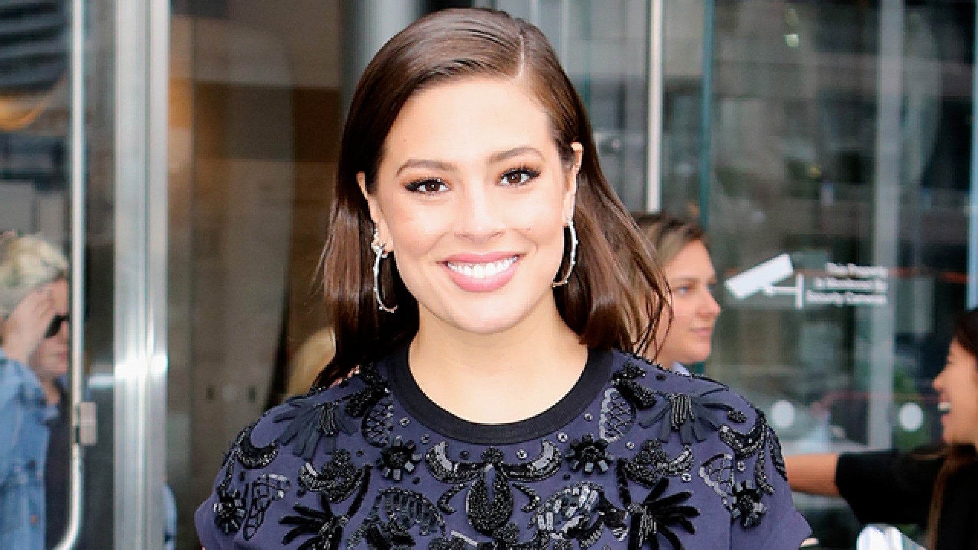 Ashley Graham puts on a sultry display in sheer sequined minidress