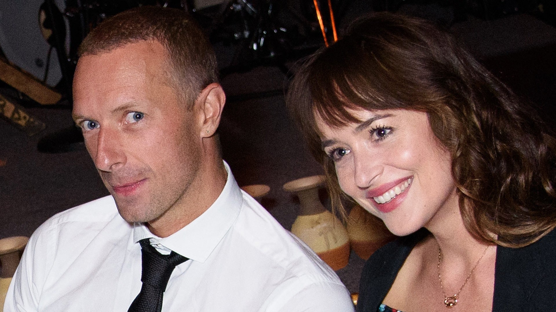 Chris Martin and Dakota Johnson 'Happily Together,' Despite Split Report